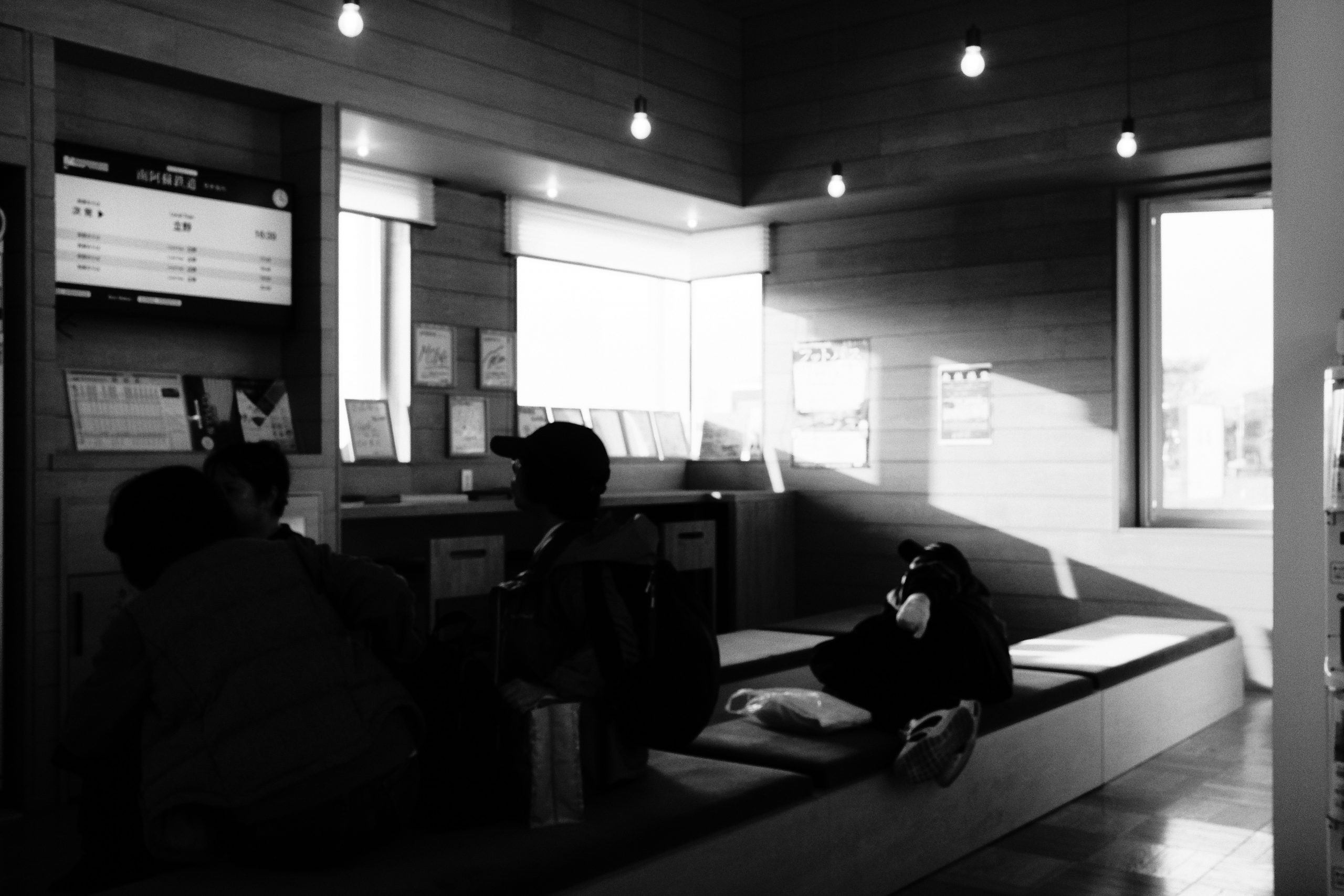 A free stock image from Unsplash showing a tablet on a construction site with blueprints and tools.